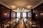 Banquet hall with stucco, chandelier and oak parquet