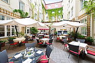 Idyllic courtyard of Hotel Albrechtshof adjacent to restaurant ALvis
